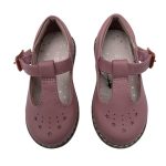 Shade of pink shoe with star design and buckle strap