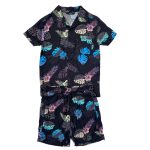 Black short sleeve shirt with leave designs and a matching short